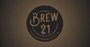 Brew 21 Extra Chromosome Coffee Co. logo, a mission-driven coffee shop on Historic C-Street.