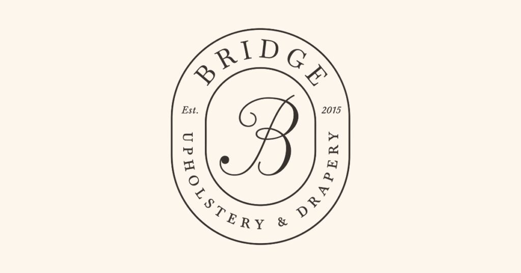 Bridge Upholstery & Drapery logo, a custom upholstery shop on Historic C-Street.