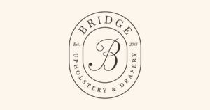 Bridge Upholstery & Drapery logo, a custom upholstery shop on Historic C-Street.