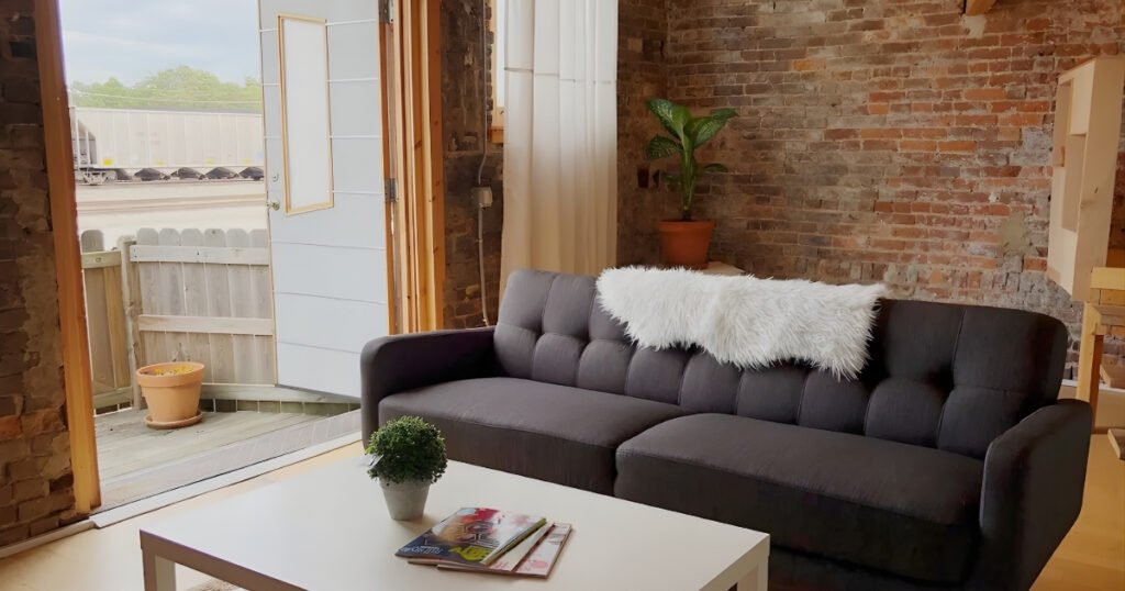 Interior of Westend Loft Two, a loft rental with exposed brick on Historic Commercial Street, Springfield, MO.