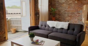 Interior of Westend Loft Two, a loft rental with exposed brick on Historic Commercial Street, Springfield, MO.
