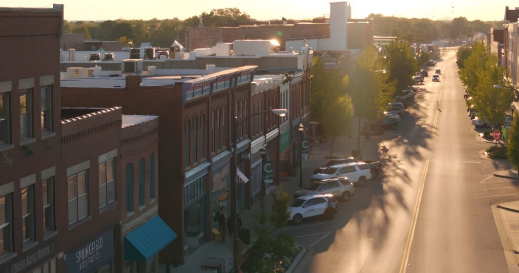 An elevated golden-hour view down Historic Commercial Street for a things-to-do guide, Springfield, MO.