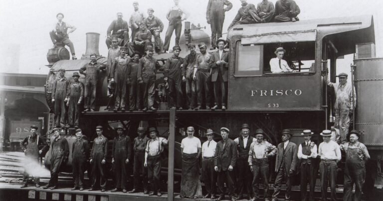 Archival photograph of a Frisco railroad crew and locomotive from the Historic C-Street collection, Springfield, MO.