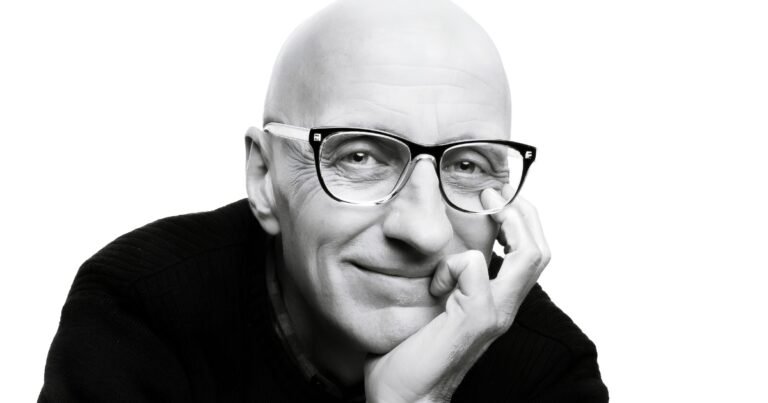 Black-and-white portrait of Springfield photographer Randy Bacon of Historic C-Street, Missouri.