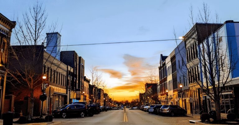 Historic Commercial Street at sunset with storefronts down the block, Springfield, Missouri.