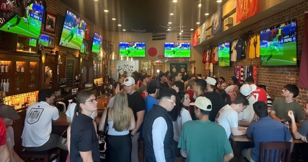 A packed crowd watching the World Cup on screens inside Mumbles 1888 pub on C-Street, Springfield, MO.