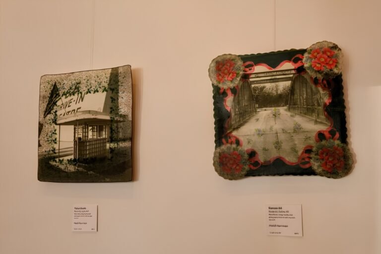Two framed mixed-media artworks, a house and the footbridge, from Two Voices One Road, Springfield, MO.