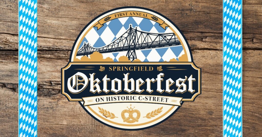 First Annual Springfield Oktoberfest on Historic C-Street logo with a Bavarian blue-and-white crest, bridge, and pretzel.